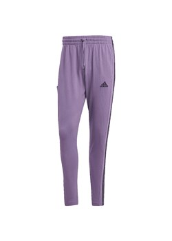 Spodnie męskie adidas Essentials Single Jersey Tapered Open Hem 3-Stripes ze sklepu Decathlon w kategorii Spodnie męskie - zdjęcie 176153882