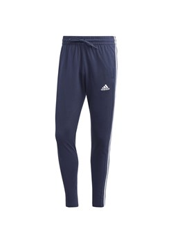 Spodnie męskie adidas Essentials Single Jersey Tapered Open Hem 3-Stripes ze sklepu Decathlon w kategorii Spodnie męskie - zdjęcie 176153883