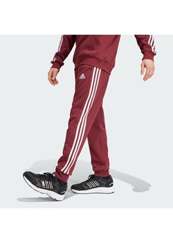 Spodnie Essentials Fleece 3-Stripes Tapered Cuff ze sklepu Decathlon w kategorii Spodnie męskie - zdjęcie 176180461