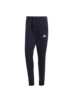 Spodnie adidas Essentials Fleece Regular Fit Tapered Cuff ze sklepu Decathlon w kategorii Spodnie męskie - zdjęcie 176199580