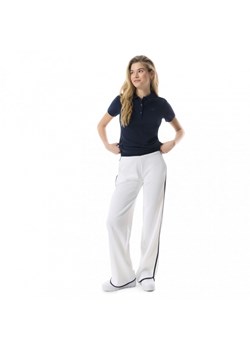 Damskie spodnie dresowe Guess Mylah Long Pant - białe ze sklepu Sportstylestory.com w kategorii Spodnie damskie - zdjęcie 176235622