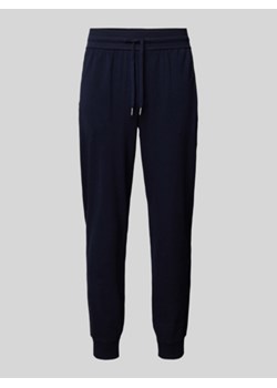 Spodnie typu track pants o kroju tapered fit z tunelem ze sklepu Peek&Cloppenburg  w kategorii Spodnie męskie - zdjęcie 176300531