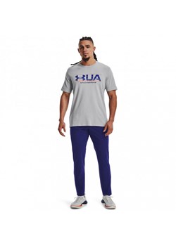 Męskie spodnie treningowe UNDER ARMOUR UA STRETCH WOVEN PANT - granatowe ze sklepu Sportstylestory.com w kategorii Spodnie męskie - zdjęcie 176417443