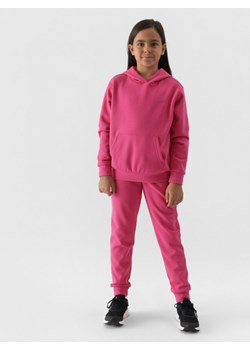 Dziewczęce spodnie dresowe joggery 4F 4FJWMM00TTROF0828 - różowe ze sklepu Sportstylestory.com w kategorii Spodnie dziewczęce - zdjęcie 176418780