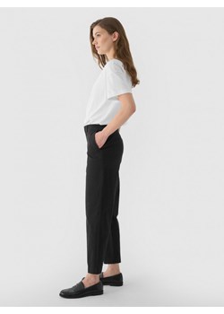 Damskie spodnie casual tkaninowe Outhorn OTHWAW24TTROF1084 - czarne ze sklepu Sportstylestory.com w kategorii Spodnie damskie - zdjęcie 176422920
