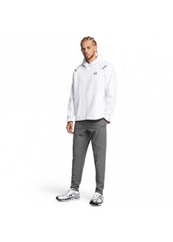 Męskie spodnie treningowe Under Armour UA Unstoppable Tapered Pants - szare ze sklepu Sportstylestory.com w kategorii Spodnie męskie - zdjęcie 176570322