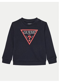 Guess Bluza N73Q10 KAUG0 Granatowy Regular Fit ze sklepu MODIVO w kategorii Bluzy chłopięce - zdjęcie 176658470