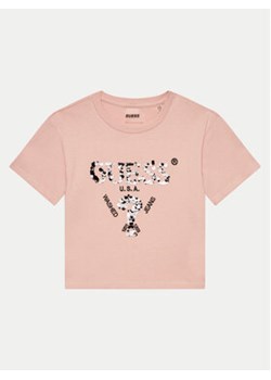 Guess T-Shirt J4YI46 K8FQ4 Różowy Boxy Fit ze sklepu MODIVO w kategorii Bluzki dziewczęce - zdjęcie 176714390