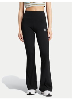 adidas Legginsy Essentials IW5727 Czarny Slim Fit ze sklepu MODIVO w kategorii Spodnie damskie - zdjęcie 176749051