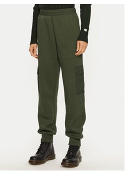 Champion Spodnie dresowe 117499 Khaki Regular Fit ze sklepu MODIVO w kategorii Spodnie damskie - zdjęcie 176803374