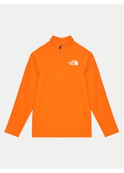 The North Face Polar Glacier NF0A8AZM Pomarańczowy Regular Fit ze sklepu MODIVO w kategorii Bluzy chłopięce - zdjęcie 176827240