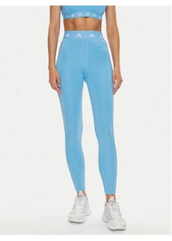 adidas Legginsy Techfit Stash IU1864 Błękitny Slim Fit ze sklepu MODIVO w kategorii Spodnie damskie - zdjęcie 176833061