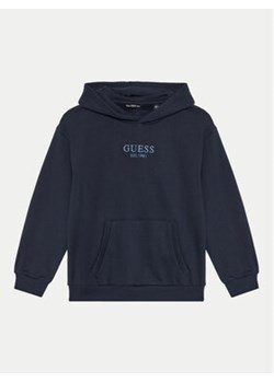 Guess Bluza L4BQ29 KAV33 Granatowy Regular Fit ze sklepu MODIVO w kategorii Bluzy chłopięce - zdjęcie 176942874