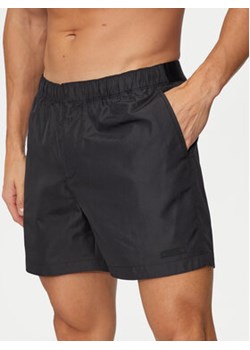 Calvin Klein Swimwear Szorty kąpielowe KM0KM01084 Czarny Slim Fit ze sklepu MODIVO w kategorii Kąpielówki - zdjęcie 176947400