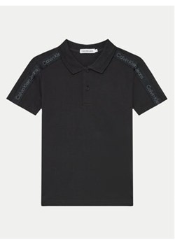 Calvin Klein Jeans Polo IB0IB02149 Czarny Regular Fit ze sklepu MODIVO w kategorii T-shirty chłopięce - zdjęcie 176949900