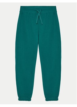 United Colors Of Benetton Spodnie dresowe 3EB5CF05L Zielony Regular Fit ze sklepu MODIVO w kategorii Spodnie chłopięce - zdjęcie 177012651