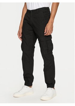 Tommy Jeans Joggery Ethan DM0DM19490 Czarny Regular Fit ze sklepu MODIVO w kategorii Spodnie męskie - zdjęcie 177043464