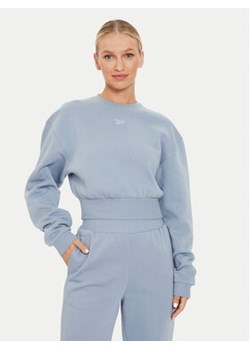 Reebok Bluza Fleece Coverup 100076122 Niebieski Regular Fit ze sklepu MODIVO w kategorii Bluzy damskie - zdjęcie 177199203