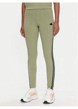 adidas Legginsy Future Icons 3-Stripes IW5291 Zielony Slim Fit ze sklepu MODIVO w kategorii Spodnie damskie - zdjęcie 177221150