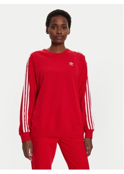 adidas Bluza 3-Stripes IN8487 Czerwony Oversize ze sklepu MODIVO w kategorii Bluzy damskie - zdjęcie 177229370