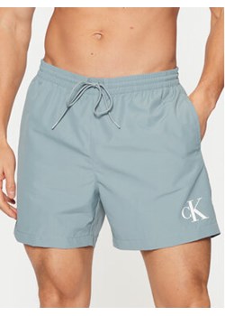 Calvin Klein Swimwear Szorty kąpielowe KM0KM01161 Zielony Regular Fit ze sklepu MODIVO w kategorii Kąpielówki - zdjęcie 177343801