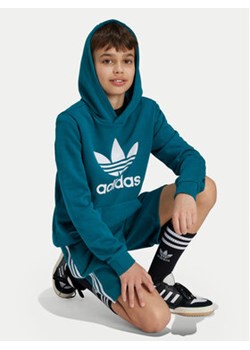 adidas Bluza Trefoil IY7440 Turkusowy Regular Fit ze sklepu MODIVO w kategorii Bluzy chłopięce - zdjęcie 177373440