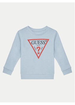 Guess Bluza N73Q10 KAUG0 Granatowy Regular Fit ze sklepu MODIVO w kategorii Bluzy chłopięce - zdjęcie 177427980