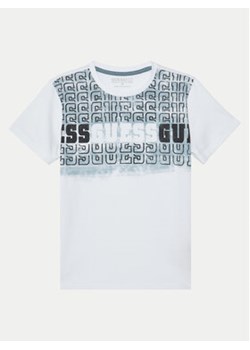 Guess T-Shirt L5RI23 K8HM4 Biały Regular Fit ze sklepu MODIVO w kategorii T-shirty chłopięce - zdjęcie 177430703