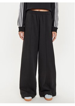 adidas Spodnie dresowe Premium Essentials IW5739 Czarny Wide Leg ze sklepu MODIVO w kategorii Spodnie damskie - zdjęcie 177519700