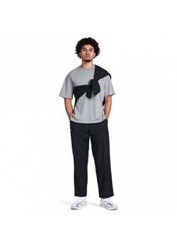 Męskie spodnie treningowe Under Armour UA Rush Woven Pants - czarne ze sklepu Sportstylestory.com w kategorii Spodnie męskie - zdjęcie 177573352