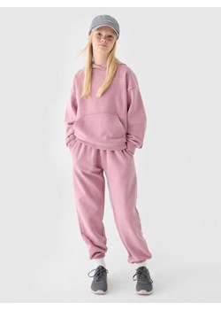 Dziewczęce spodnie dresowe joggery 4F 4FJRAW24TTROF1069 - różowe ze sklepu Sportstylestory.com w kategorii Spodnie dziewczęce - zdjęcie 177574420