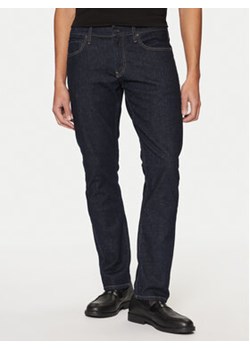 Calvin Klein Jeansy K10K111241 Granatowy Slim Fit ze sklepu MODIVO w kategorii Jeansy męskie - zdjęcie 177599484