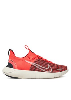 Nike Buty do biegania Free RN NN DX6482 Pomarańczowy ze sklepu MODIVO w kategorii Buty sportowe damskie - zdjęcie 177607444