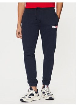 Tommy Jeans Spodnie dresowe Entry DM0DM20277 Granatowy Slim Fit ze sklepu MODIVO w kategorii Spodnie męskie - zdjęcie 177608060