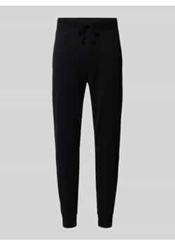 Spodnie dresowe o kroju slim fit z tunelem ze sklepu Peek&Cloppenburg  w kategorii Spodnie męskie - zdjęcie 177852064