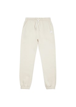 Spodnie New Balance LAKG0005LIN - beżowe ze sklepu streetstyle24.pl w kategorii Spodnie dziewczęce - zdjęcie 177862392