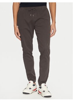 Tommy Jeans Joggery Austin DM0DM20283 Szary Slim Fit ze sklepu MODIVO w kategorii Spodnie męskie - zdjęcie 177875560