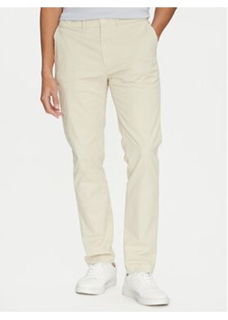 Calvin Klein Chinosy Modern Twill K10K113696 Beżowy Slim Fit ze sklepu MODIVO w kategorii Spodnie męskie - zdjęcie 177883992