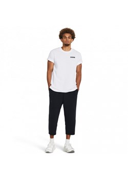 Męskie spodnie treningowe Under Armour Unstoppable Flc Baggy Crop - czarne ze sklepu Sportstylestory.com w kategorii Spodnie męskie - zdjęcie 178169891