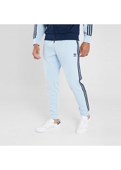 ADIDAS SPODNIE SSTP SEMI BLU/INK&#039; ze sklepu JD Sports  w kategorii Spodnie męskie - zdjęcie 178193033