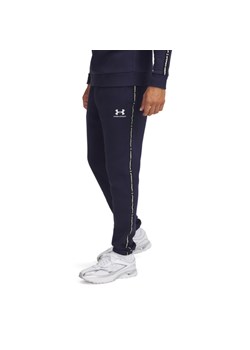 Męskie spodnie dresowe Under Armour UA Icon Fleece Jogger Taping - granatowe ze sklepu Sportstylestory.com w kategorii Spodnie męskie - zdjęcie 178253273