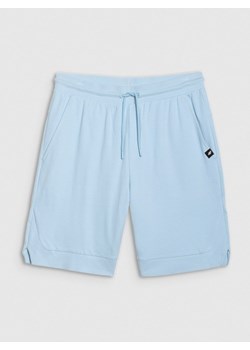 Męskie spodenki dresowe 4F 4FRSS25TSHOM686 - niebieskie ze sklepu Sportstylestory.com w kategorii Spodenki męskie - zdjęcie 178269652