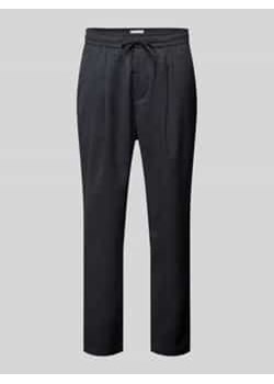 Spodnie materiałowe o kroju relaxed fit z tunelem ze sklepu Peek&Cloppenburg  w kategorii Spodnie męskie - zdjęcie 178338960