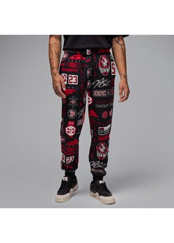Męskie dzianinowe spodnie z nadrukiem Jordan Essentials - Czerń ze sklepu Nike poland w kategorii Spodnie męskie - zdjęcie 178603234