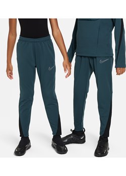 Spodnie piłkarskie dla dużych dzieci Nike Therma-FIT Academy - Zieleń ze sklepu Nike poland w kategorii Spodnie męskie - zdjęcie 178605091