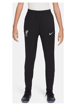 Dzianinowe spodnie piłkarskie dla dużych dzieci Nike Dri-FIT Liverpool F.C. Strike - Czerń ze sklepu Nike poland w kategorii Spodnie chłopięce - zdjęcie 178610280