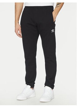 adidas Spodnie dresowe Trefoil Essentials JD2422 Czarny Slim Fit ze sklepu MODIVO w kategorii Spodnie męskie - zdjęcie 178693664