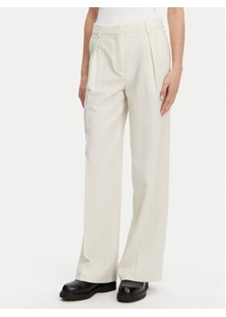 Calvin Klein Spodnie palazzo K20K208217 Beżowy Wide Leg ze sklepu MODIVO w kategorii Spodnie damskie - zdjęcie 178713462