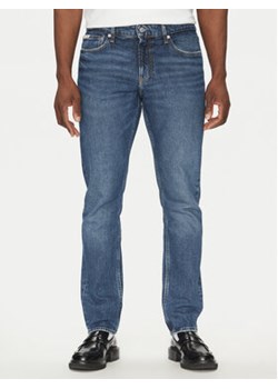 Calvin Klein Jeans Jeansy J30J327156 Niebieski Slim Fit ze sklepu MODIVO w kategorii Jeansy męskie - zdjęcie 178912092