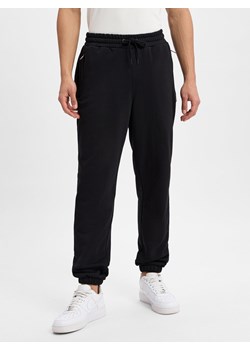 ellesse Męskie spodnie do biegania - Patras Mężczyźni Bawełna czarny jednolity - id: 754987-0001-09920 - marki Ellesse - 178918413 ellesse Męskie spodnie do biegania - Patras Mężczyźni Bawełna czarny jednolity ze sklepu vangraaf w kategorii Spodnie męskie - zdjęcie 178918413